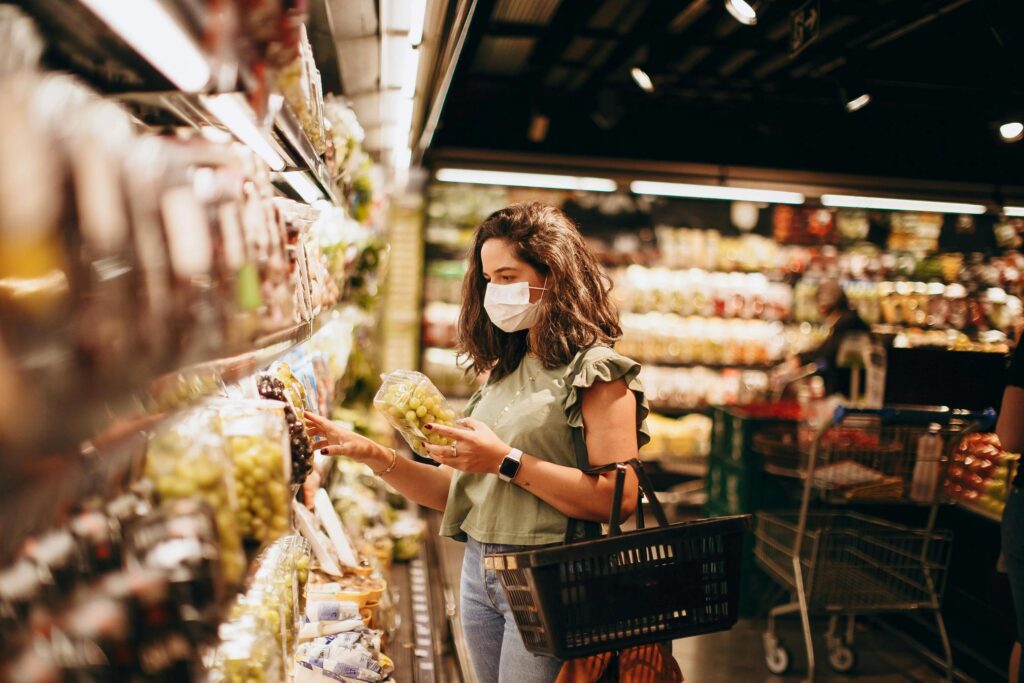 Managing the cost of living in Denmark: Woman Doing Grocery Shopping in a Supermarket in Copenhagen