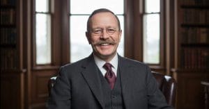 Hans Christian Gram smiling.