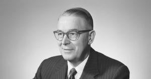 Ole Kirk Christiansen smiling.