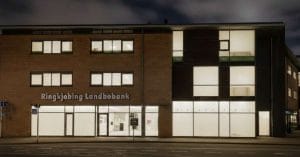 Ringkjobing Landbobank A/S building at night.