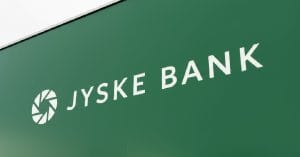 Jyske Bank A/S logo on a green board.